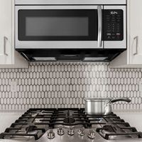 Insignia™ - 1.6 Cu. Ft. Over-the-Range Microwave - Stainless Steel - Angle