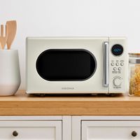 Insignia™ - .7 Cu. Ft. Retro Compact Microwave - Cream - Angle