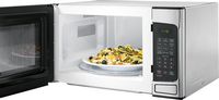 GE - 1.1 Cu. Ft. Mid-Size Microwave - Stainless steel - Left View