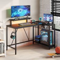 Bestier - L-Shaped Computer Desk with Power Outlets, Led Lights, and Monitor Stand - 52